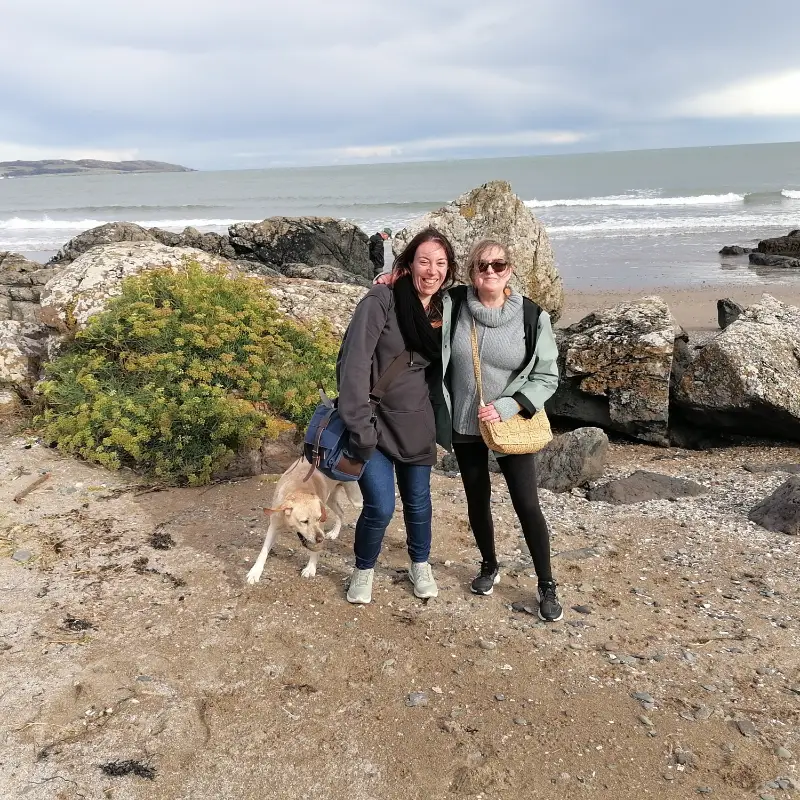 Weronica private seashore foraging with dog